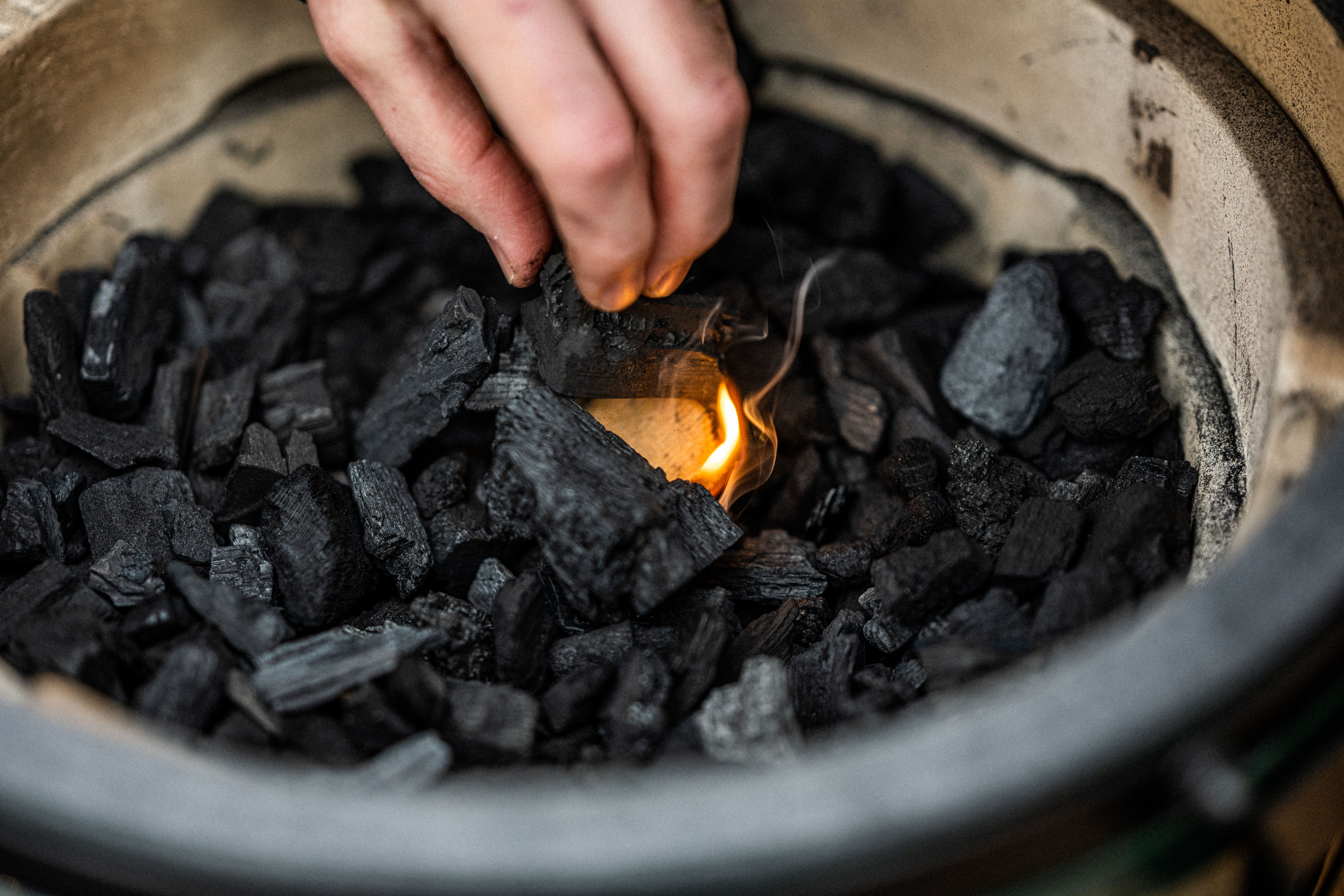 It's easy to light the EGG; just place a firestarter in the centre of your charcoals and wait!