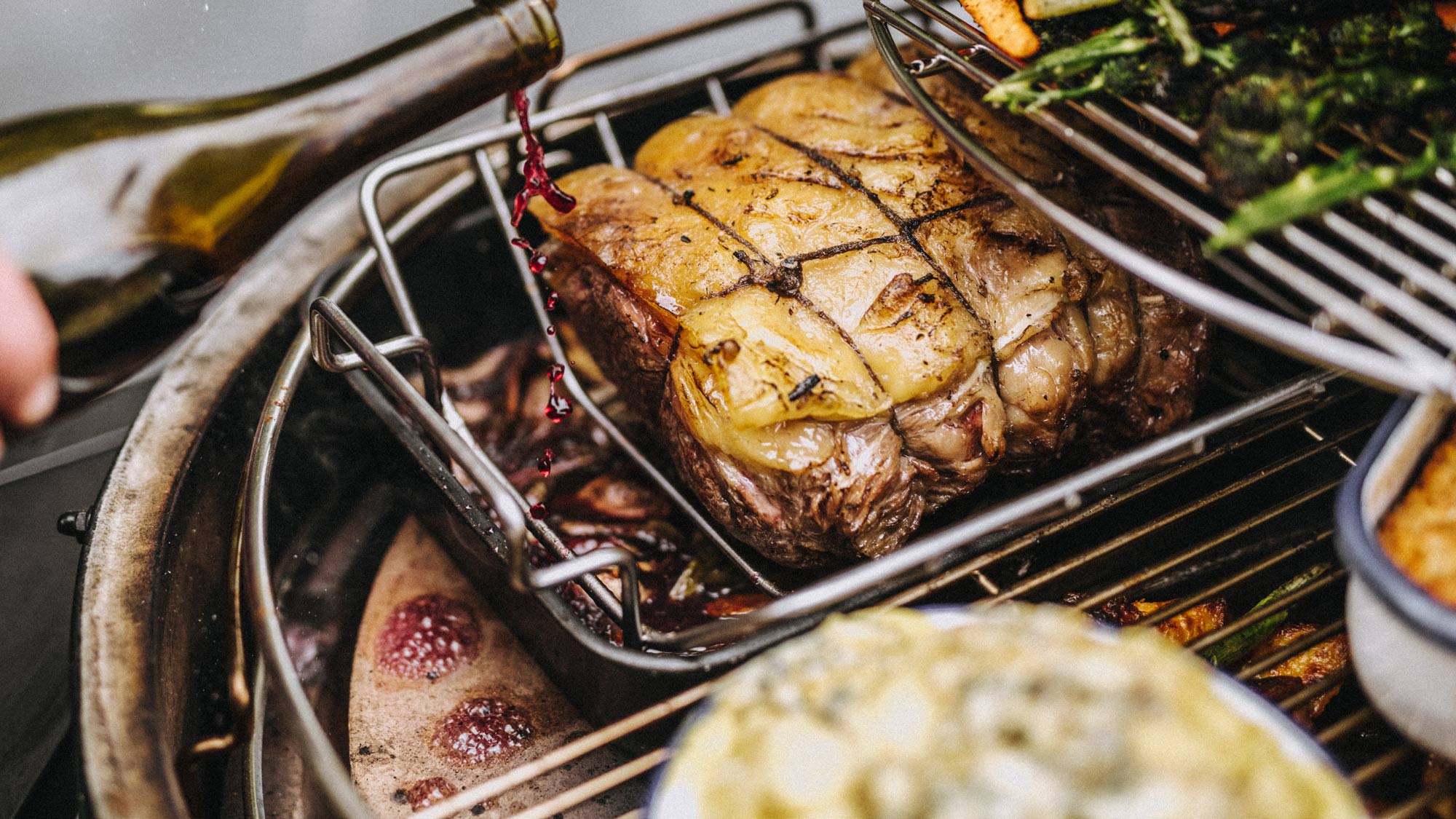 Rectangular drip pan with roasted sirloin of beef and red wine gravy
