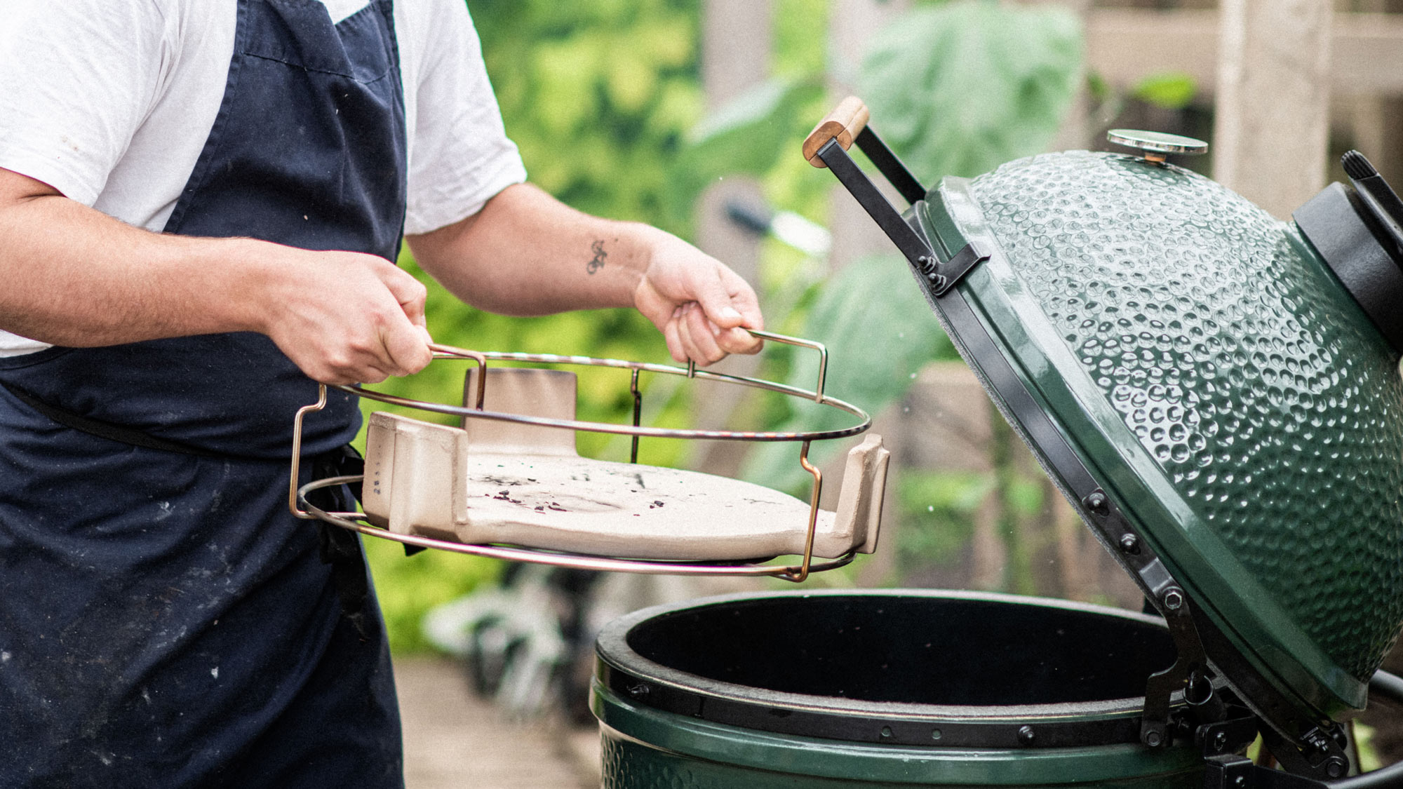 ConvEGGtor basket being put into a Large Big Green Egg