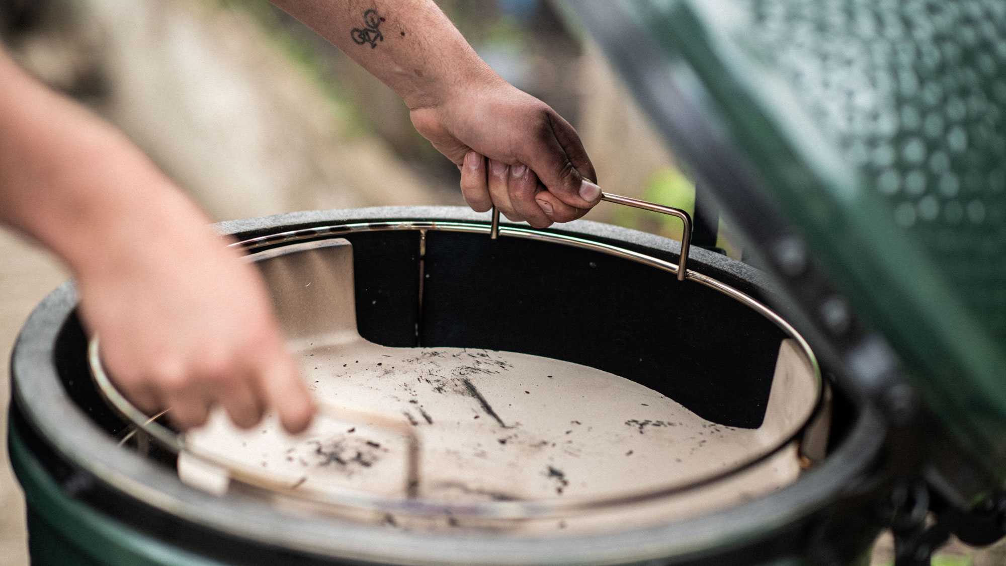 ConvEGGtor basket being put into a Large Big Green Egg