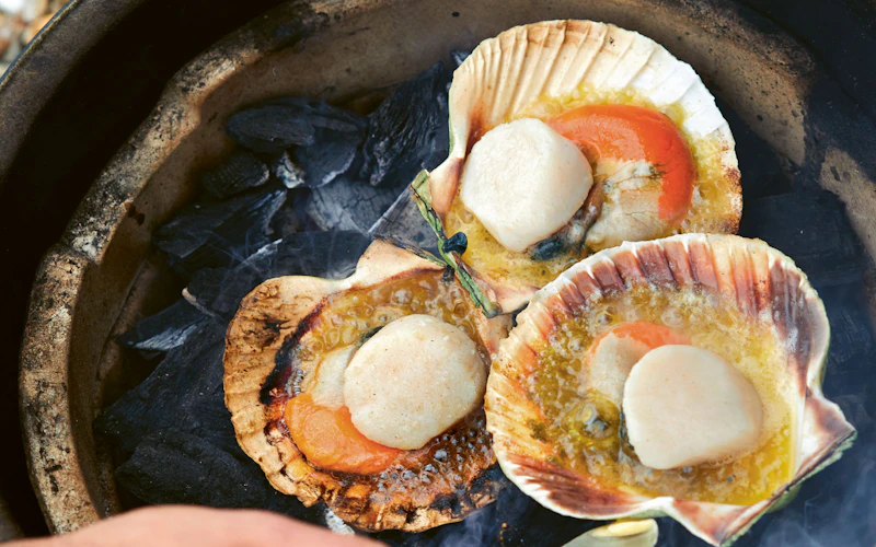 Simon Stullard, who runs the Hidden Hut in Cornwall in the UK, finishes this dish by spraying Champagne from the bottle, like a winning racing car driver, over the scallops. It’s an impressive sight and if you fancy showing off a little you could give it a try…