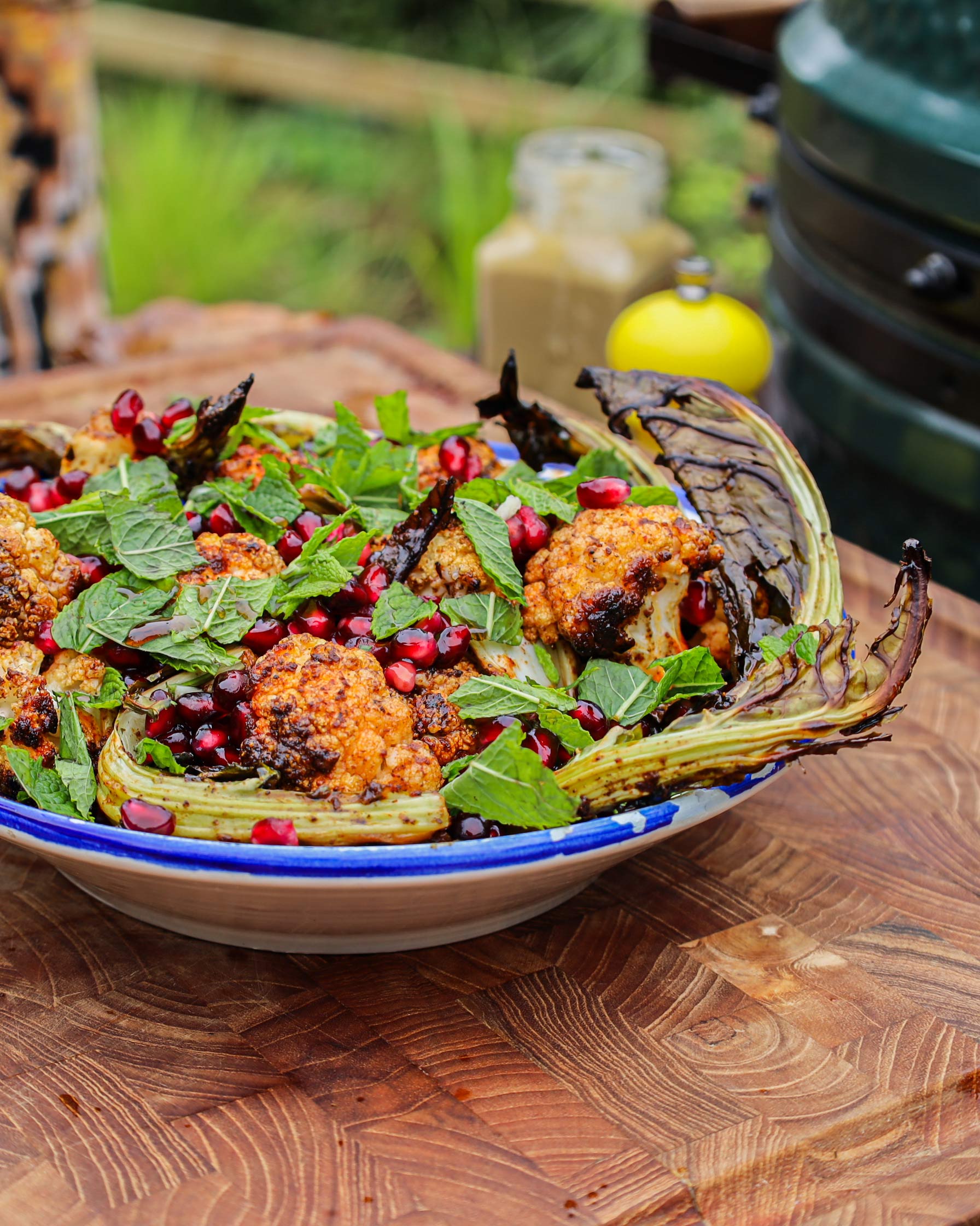 Roasted cauliflower with tahini and pomegranate | Lisa Snowdon  50 Recipes | Vegetarian | Roasting recipes | Big Green Egg