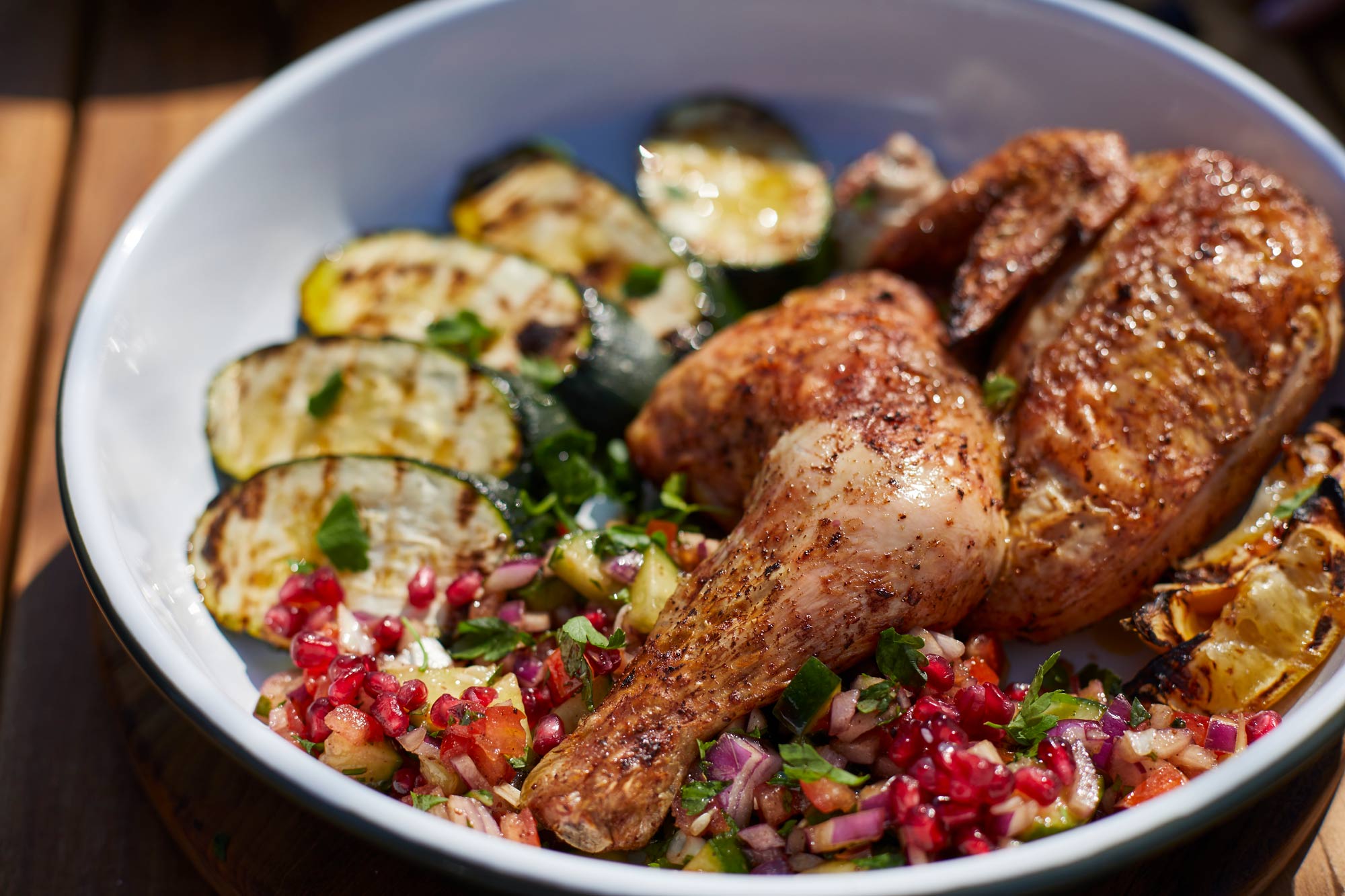 Spiced Chicken with Grilled Courgette, Mediterranean Salad and Tahini Sauce | Pollyanna Wilkinson | EGGspander System recipe | Chicken | Big Green Egg