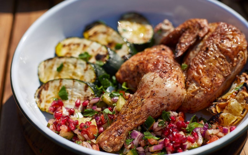 Spiced Chicken with Grilled Courgette, Mediterranean Salad and Tahini Sauce | Pollyanna Wilkinson | EGGspander System recipe | Chicken | Big Green Egg
