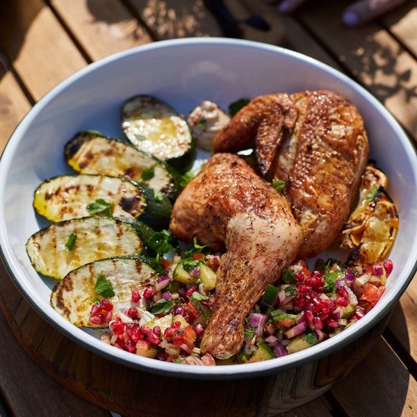 Spiced Chicken with Grilled Courgette, Mediterranean Salad and Tahini Sauce | Pollyanna Wilkinson | EGGspander System recipe | Chicken | Big Green Egg