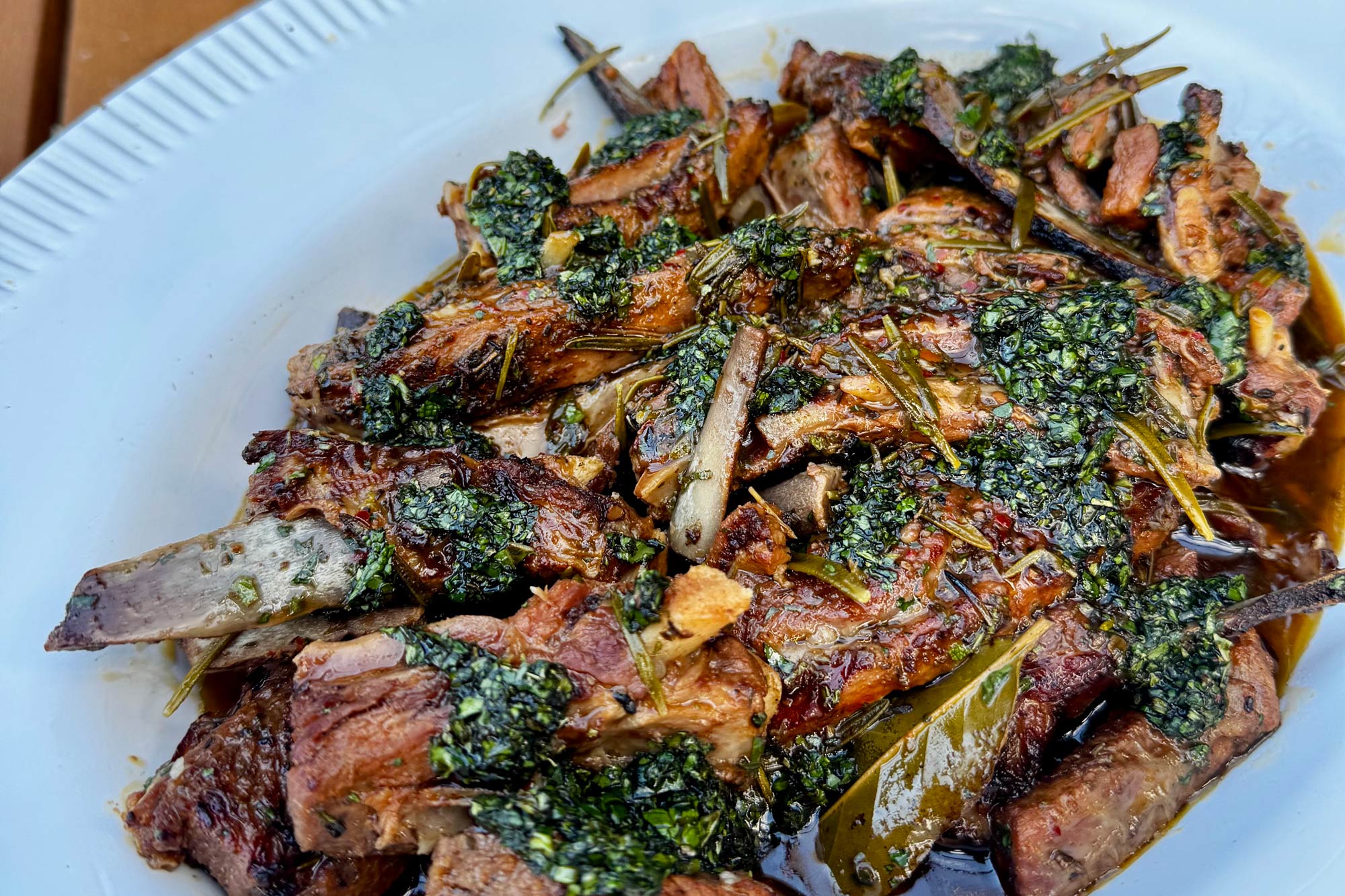 Slow-Cooked Lamb Ribs with Herby Pomegranate Molasses Sauce